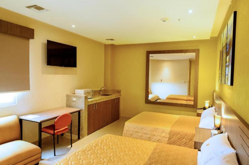 NP hotel y Suites
